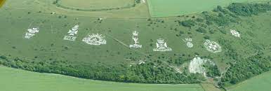 Military Badges carved and scraped into chalk downs, Wiltshire U.K.