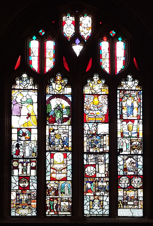 The East Window at St Andrews, Trent, Dorset showing collection of fragments from medieval European stained glass, 19th century