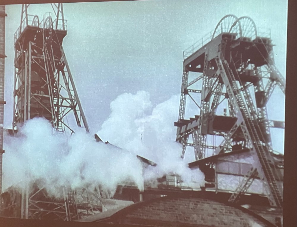 Headstocks from British Coal Mine, still from monochrome film (c1955) at St Albans Art Gallery.
